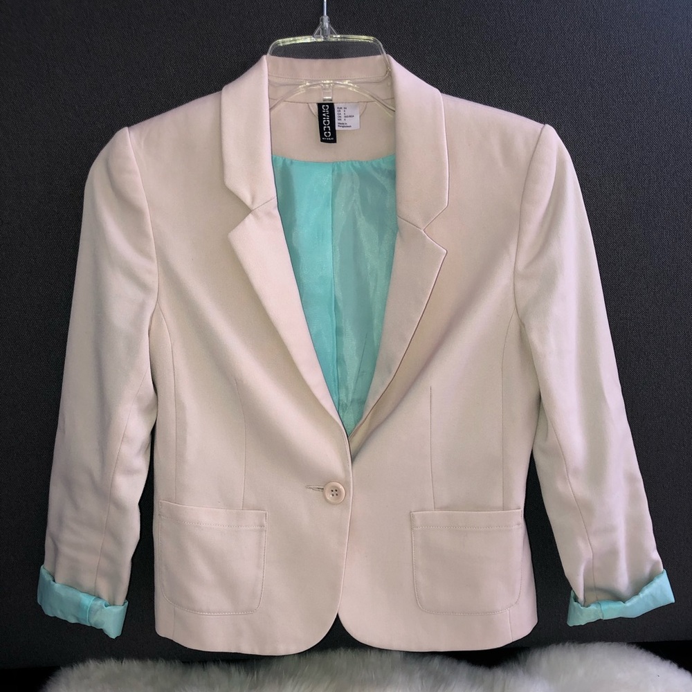 Light pink/cream with blue accent blazer